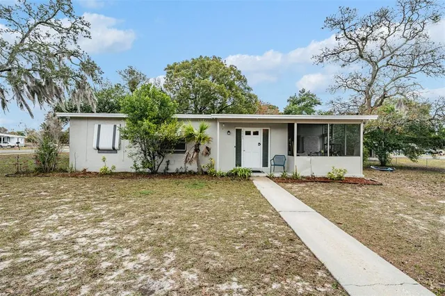 front view of house with a yard