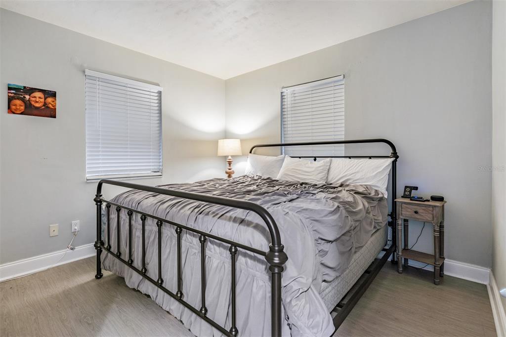 6985 Merrick Lane Spring Hill, FL 34606 - Photo 12 of 15 a bedroom with a bed and a window