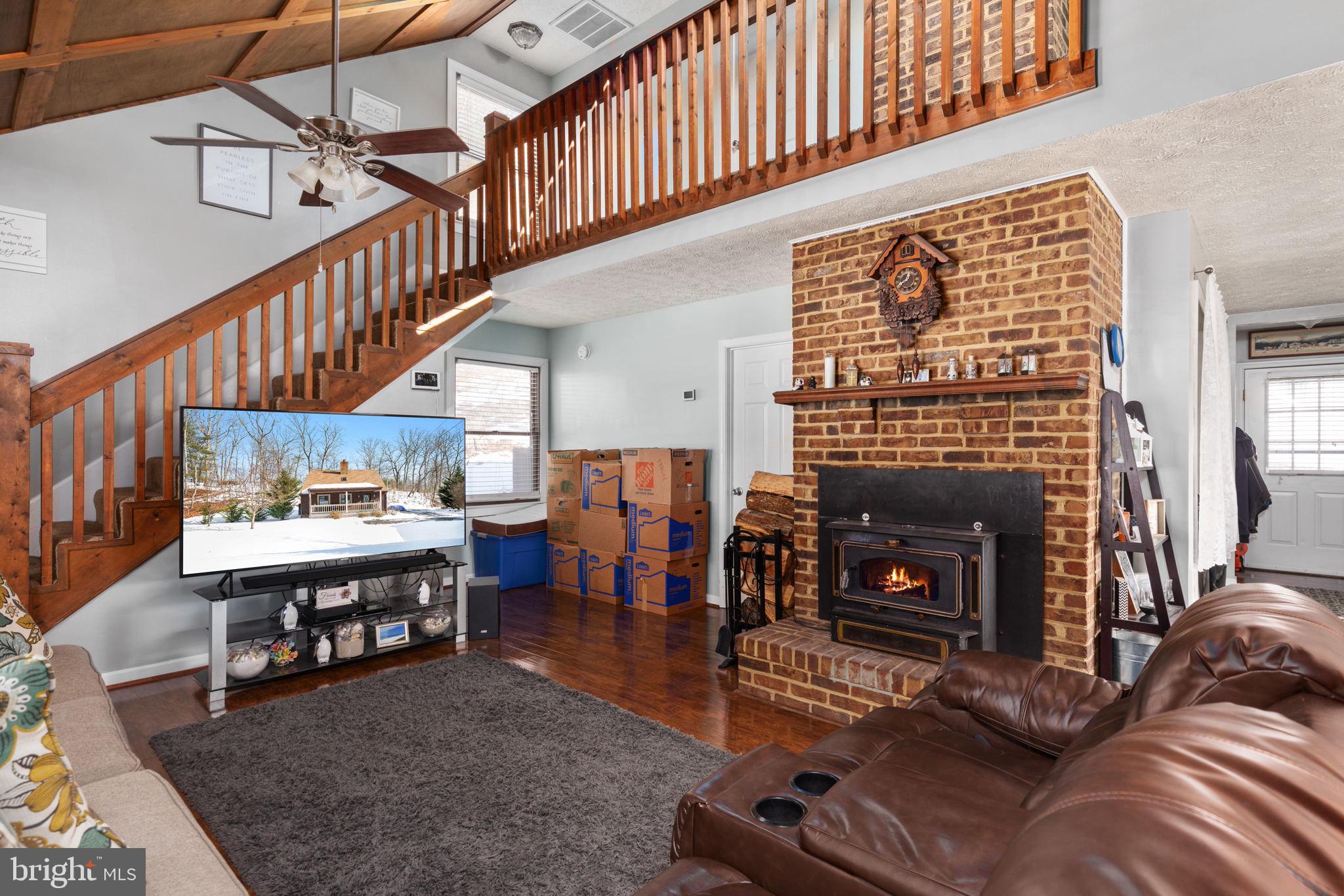 149 Holiday Road Cross Junction, VA 22625 - Photo 7 of 30 Living with wood stove