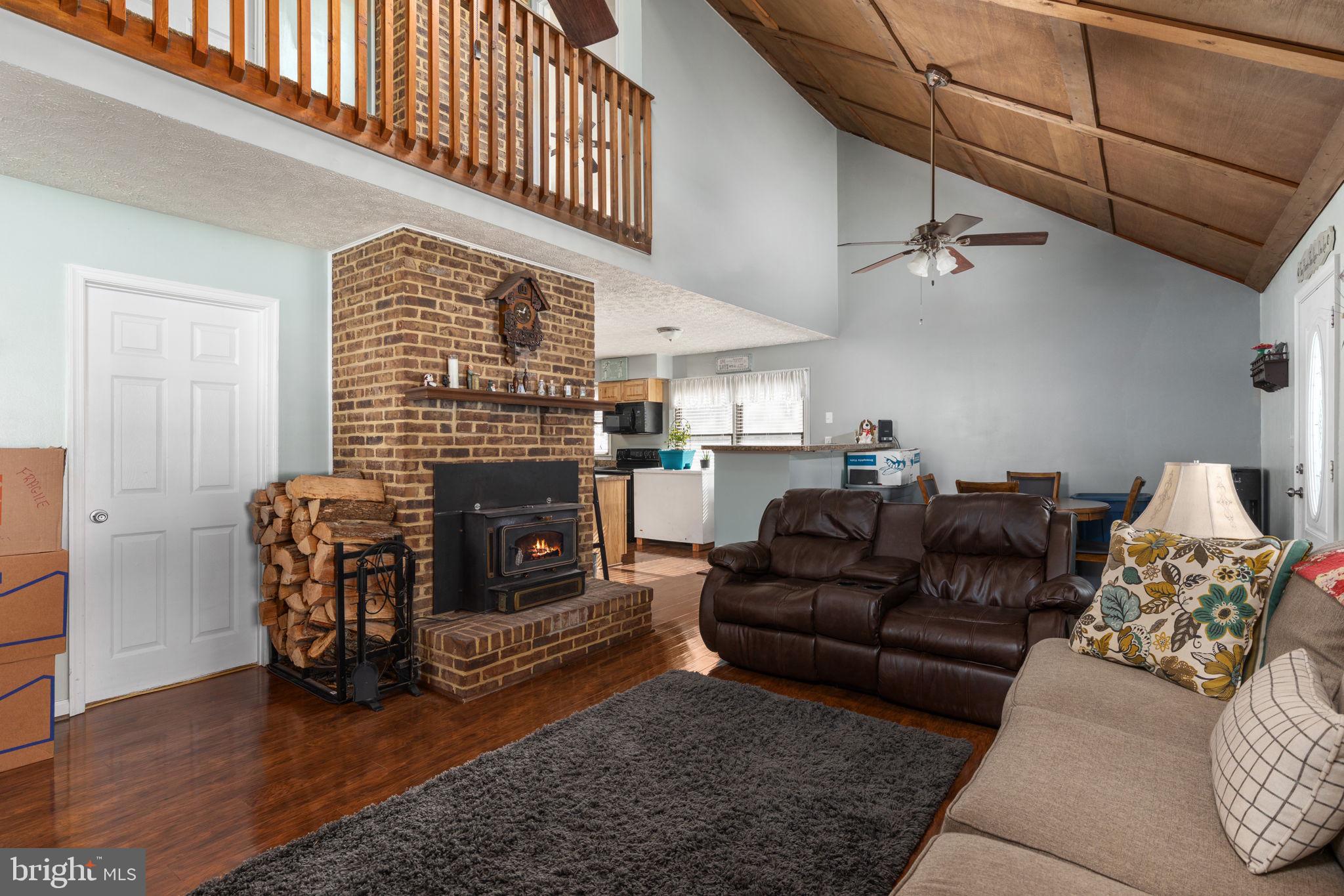 149 Holiday Road Cross Junction, VA 22625 - Photo 9 of 30 Living with wood stove