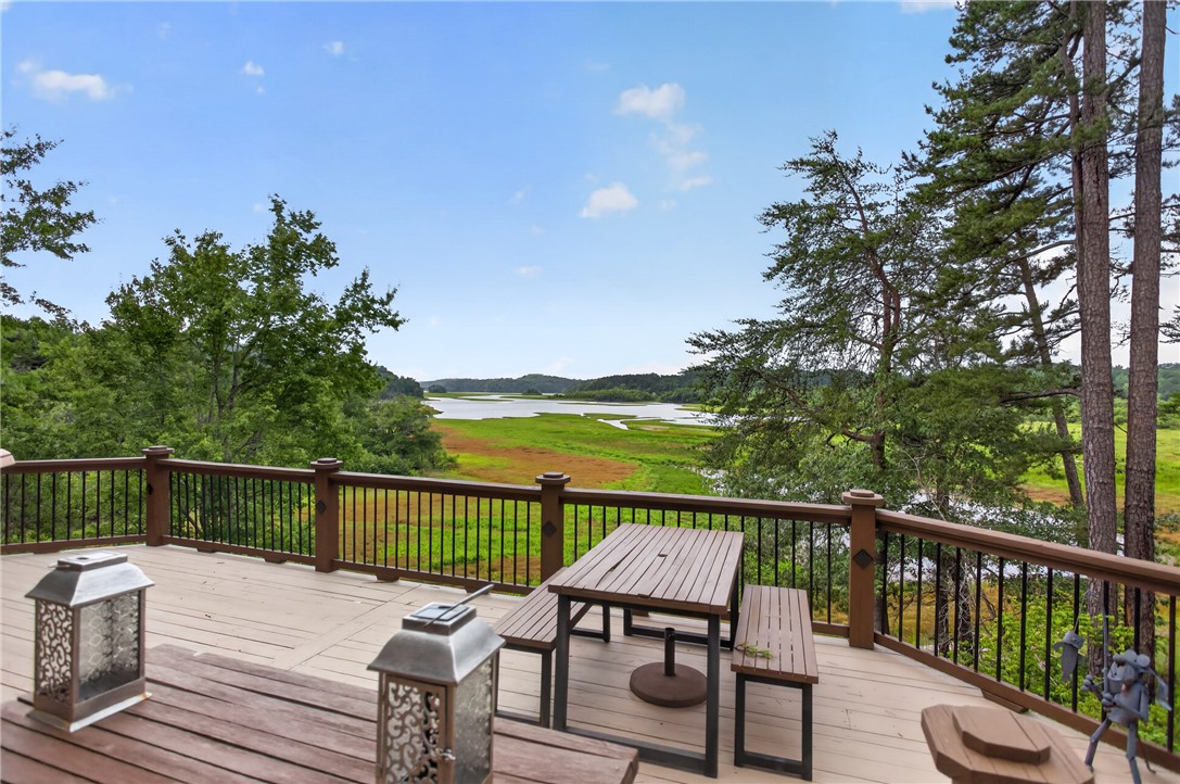 351 River Road Westminster, SC 29693 - Photo 45 of 50 An inviting deck presents wide-ranging, naturally illuminated water and meadow views.