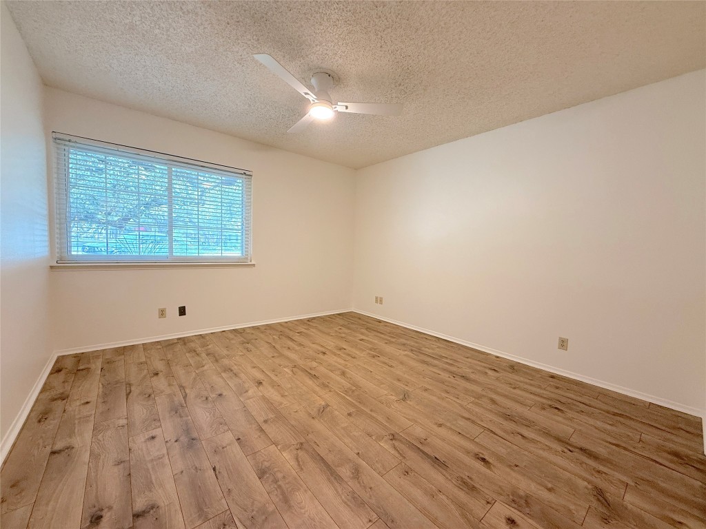 3607 Summit Bend, Unit B Austin, TX 78759 - Photo 18 of 24 wooden floor in a room