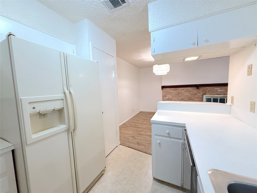 3607 Summit Bend, Unit B Austin, TX 78759 - Photo 10 of 24 a bathroom with a sink and mirror