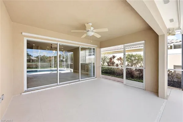 a view of an empty room with a large window
