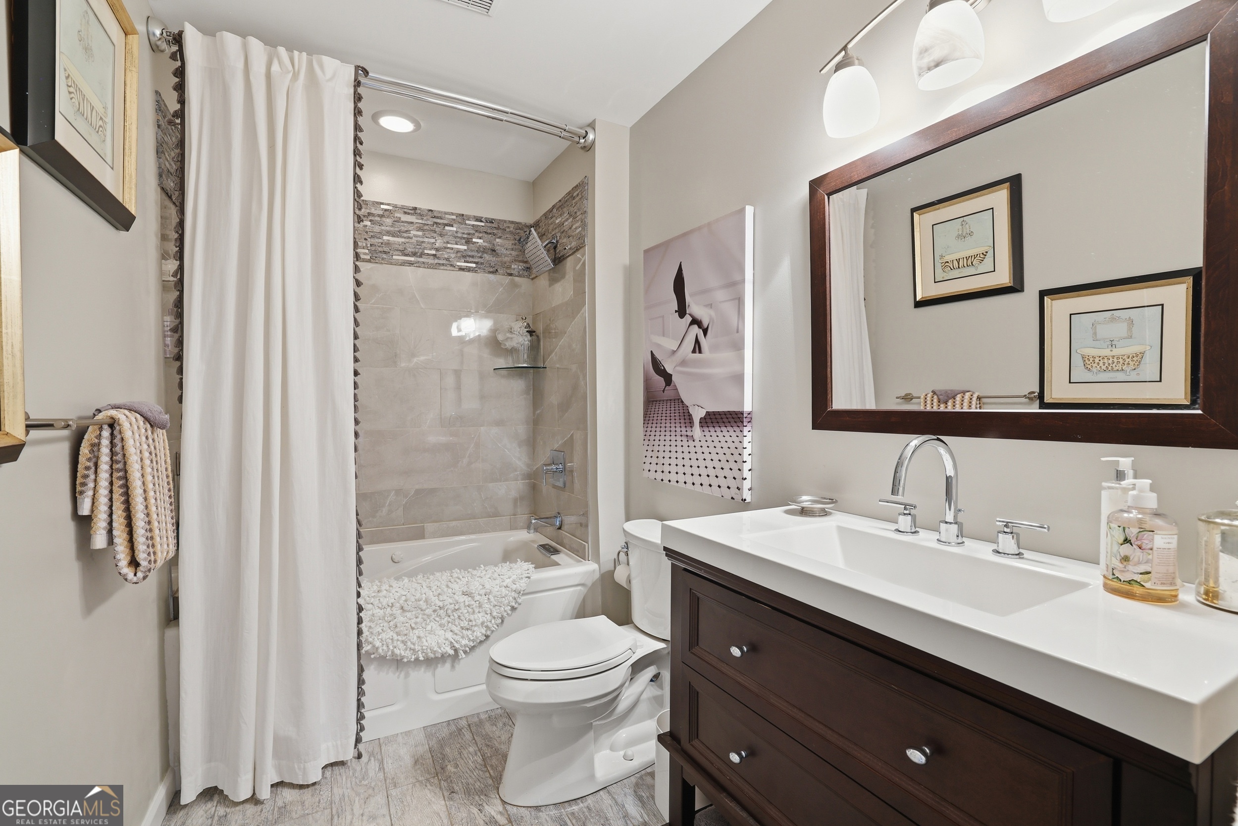 499 Ridgepole Drive Sky Valley, GA 30537 - Photo 14 of 58 a bathroom with a sink a toilet and shower