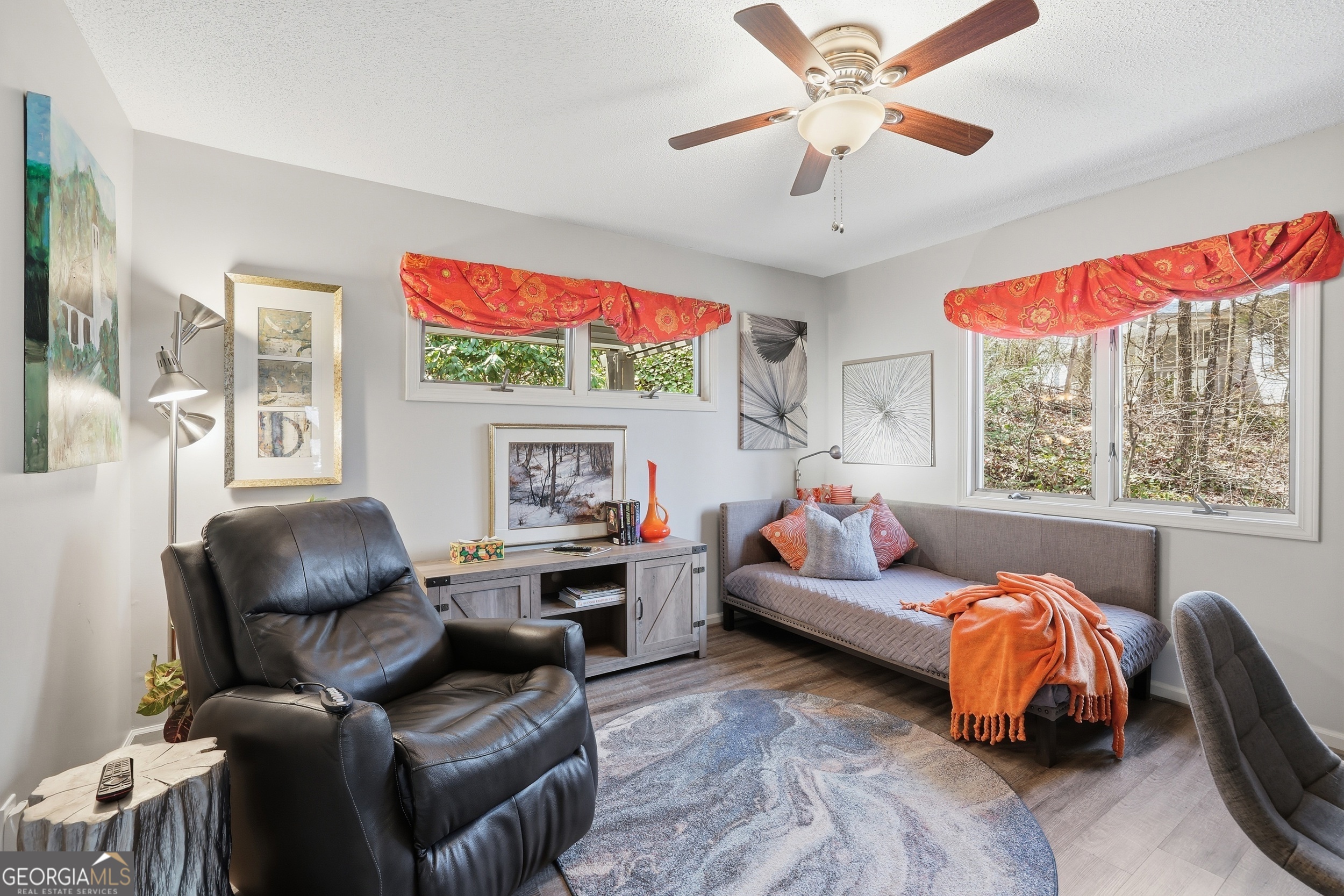 499 Ridgepole Drive Sky Valley, GA 30537 - Photo 15 of 58 a living room with furniture and a window