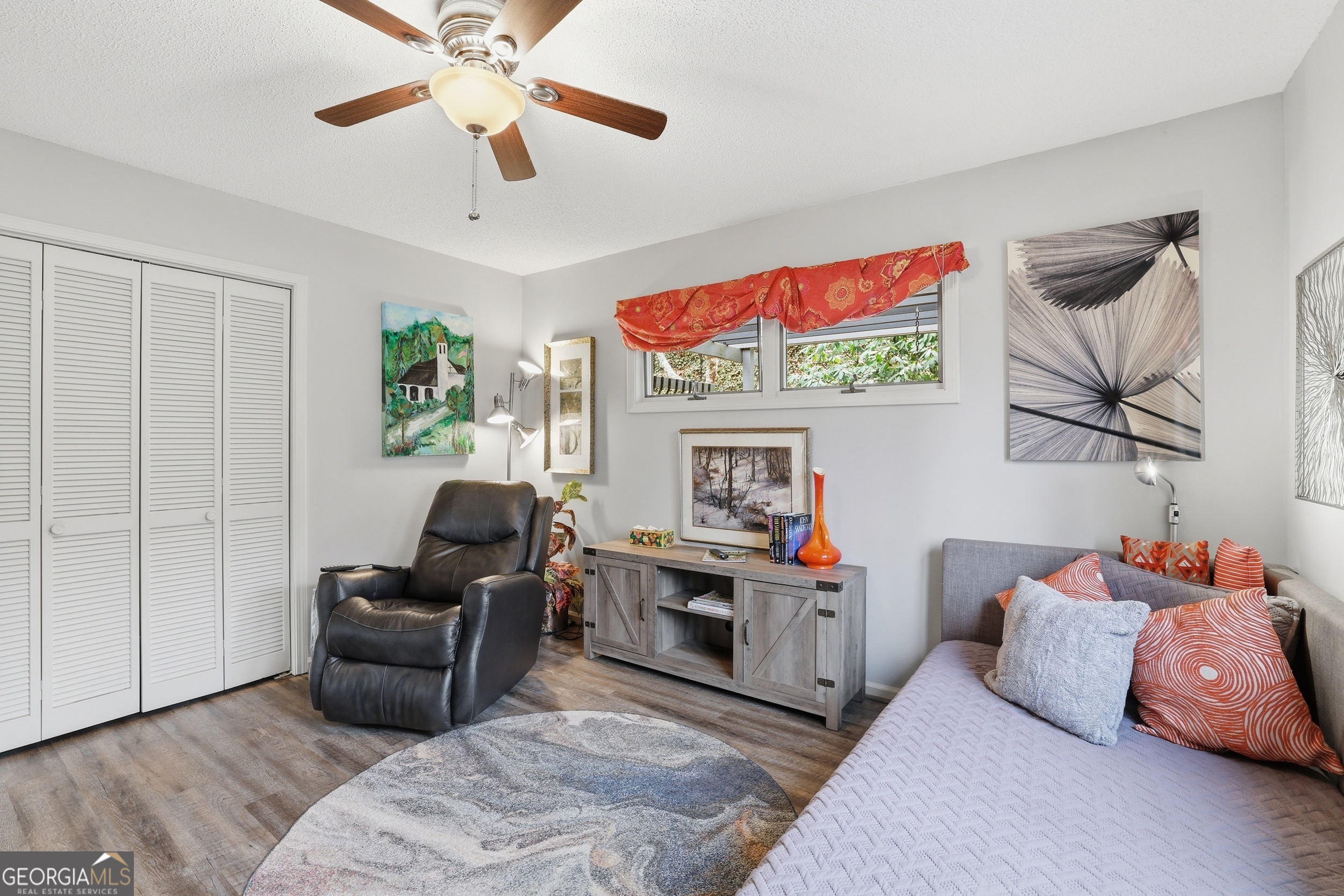 499 Ridgepole Drive Sky Valley, GA 30537 - Photo 16 of 58 a bed room with furniture and a flat screen tv