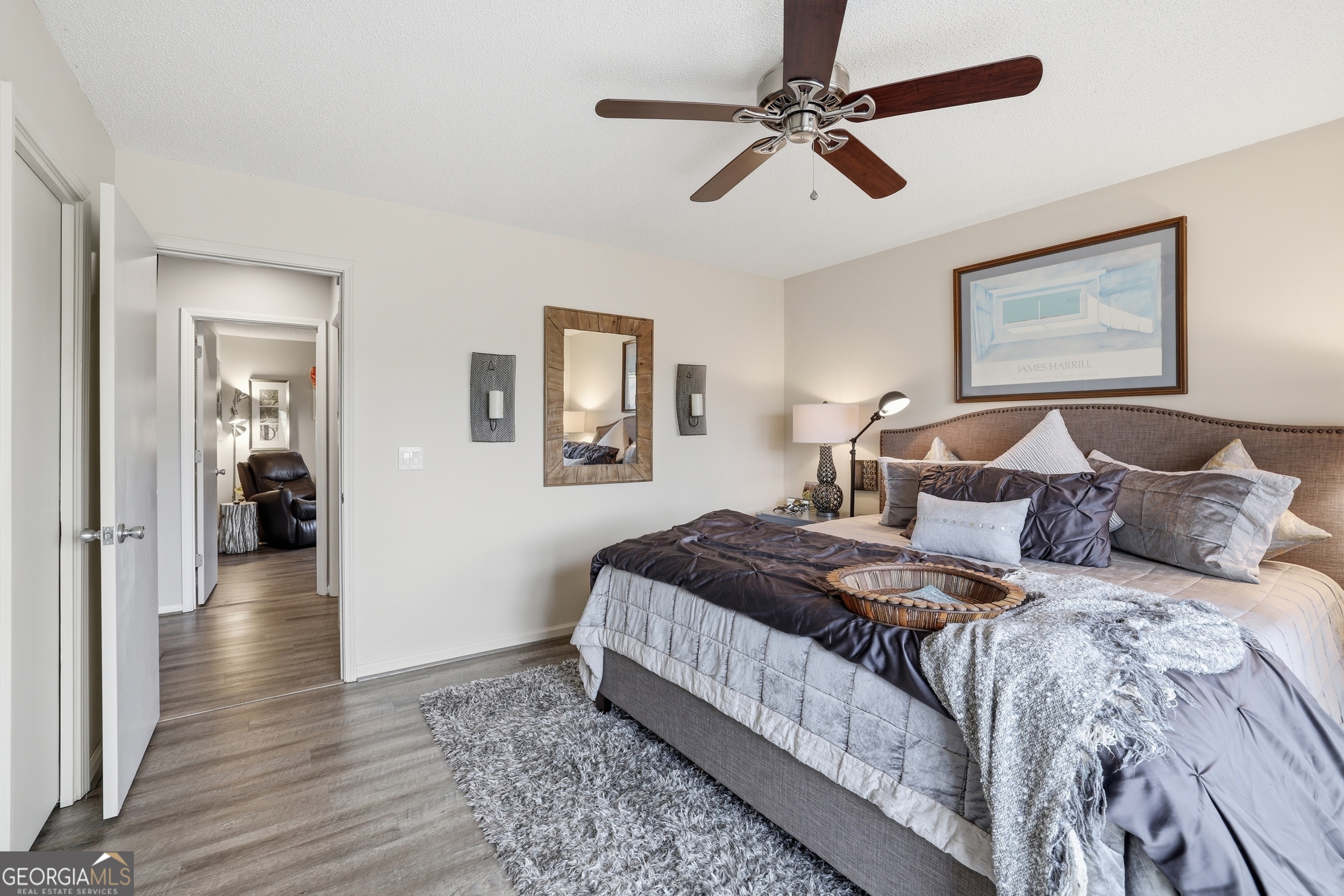 499 Ridgepole Drive Sky Valley, GA 30537 - Photo 17 of 58 a bedroom with double bed and a chandelier