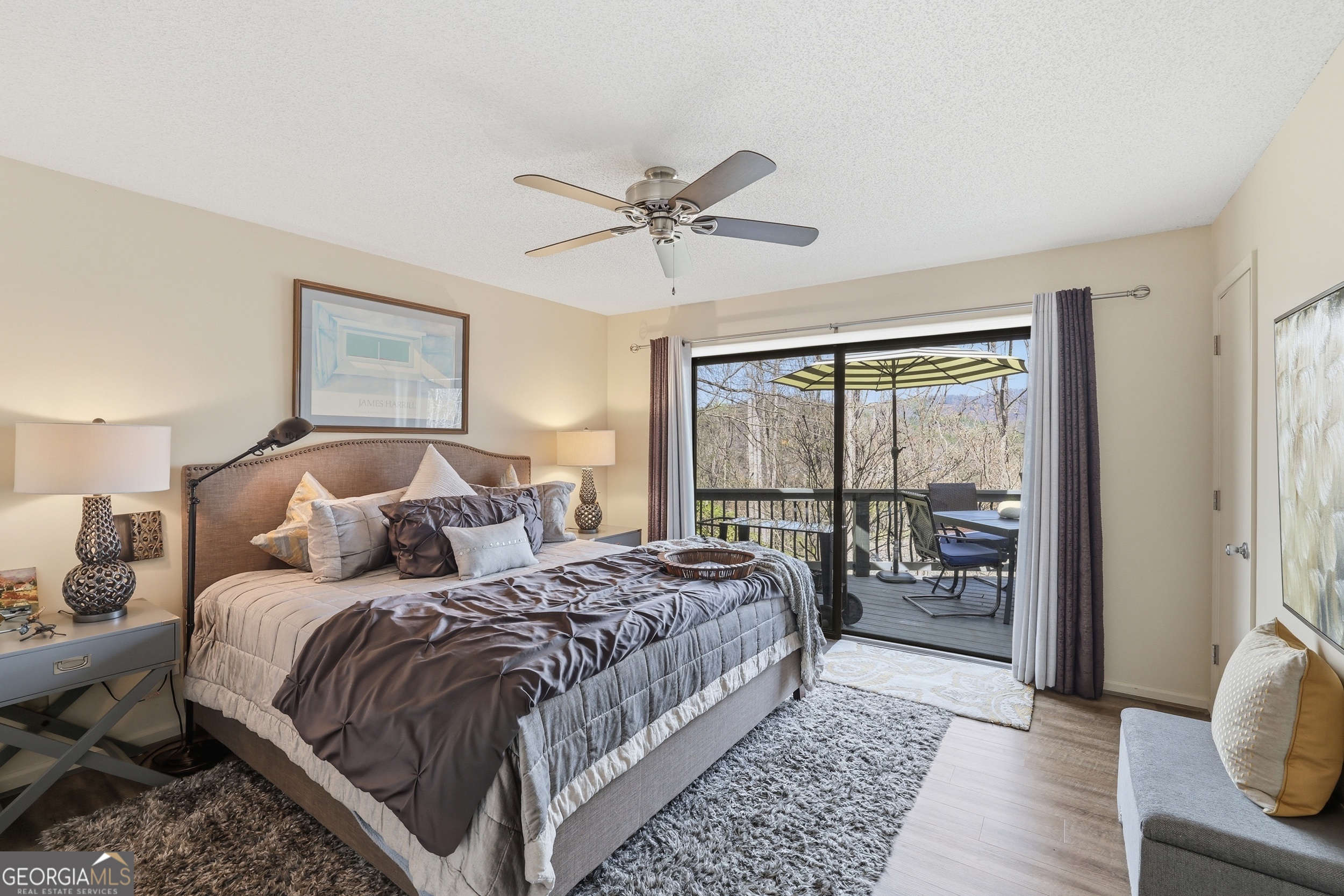 499 Ridgepole Drive Sky Valley, GA 30537 - Photo 18 of 58 a bedroom with double bed and a window