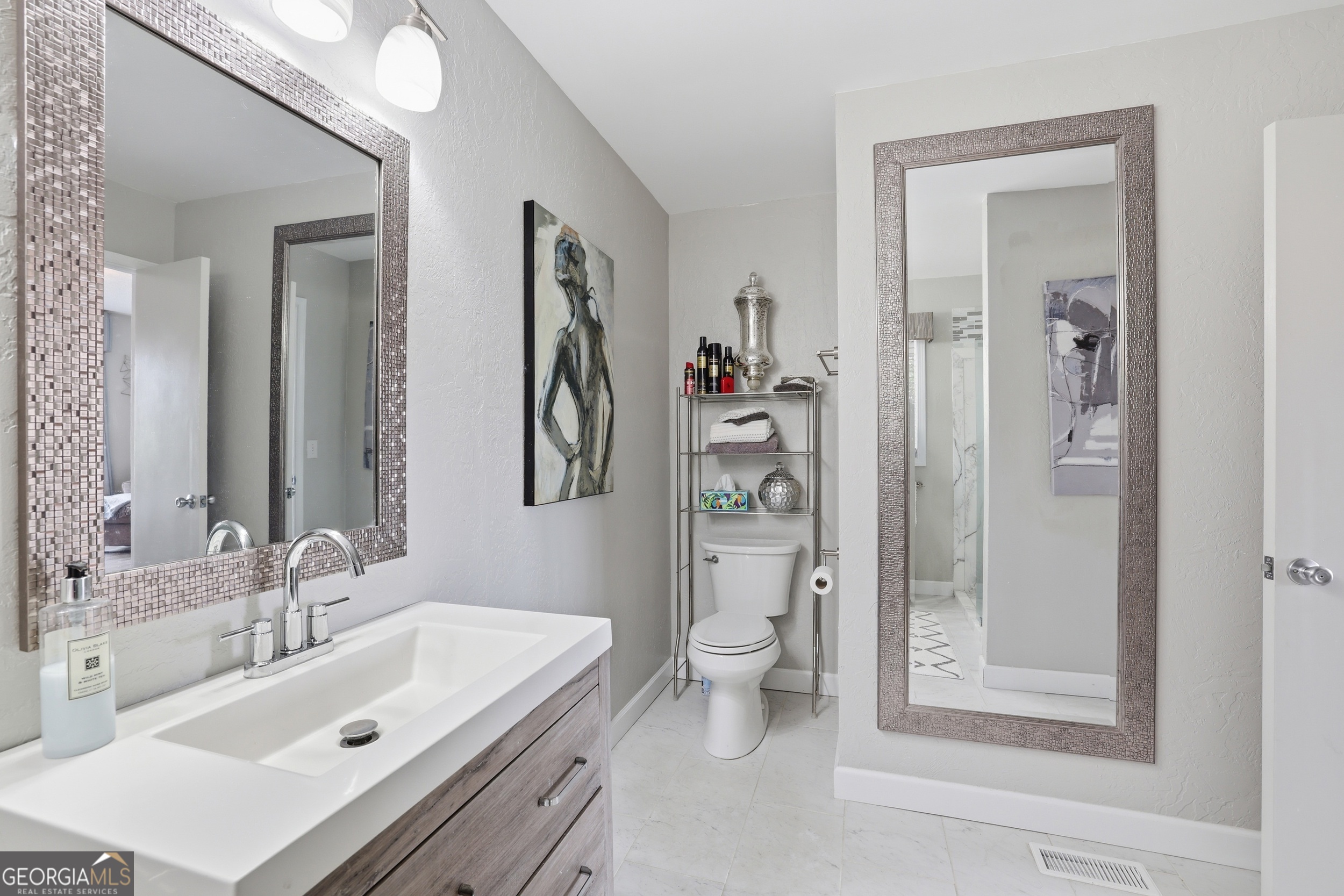 499 Ridgepole Drive Sky Valley, GA 30537 - Photo 23 of 58 a bathroom with a sink a toilet and shower