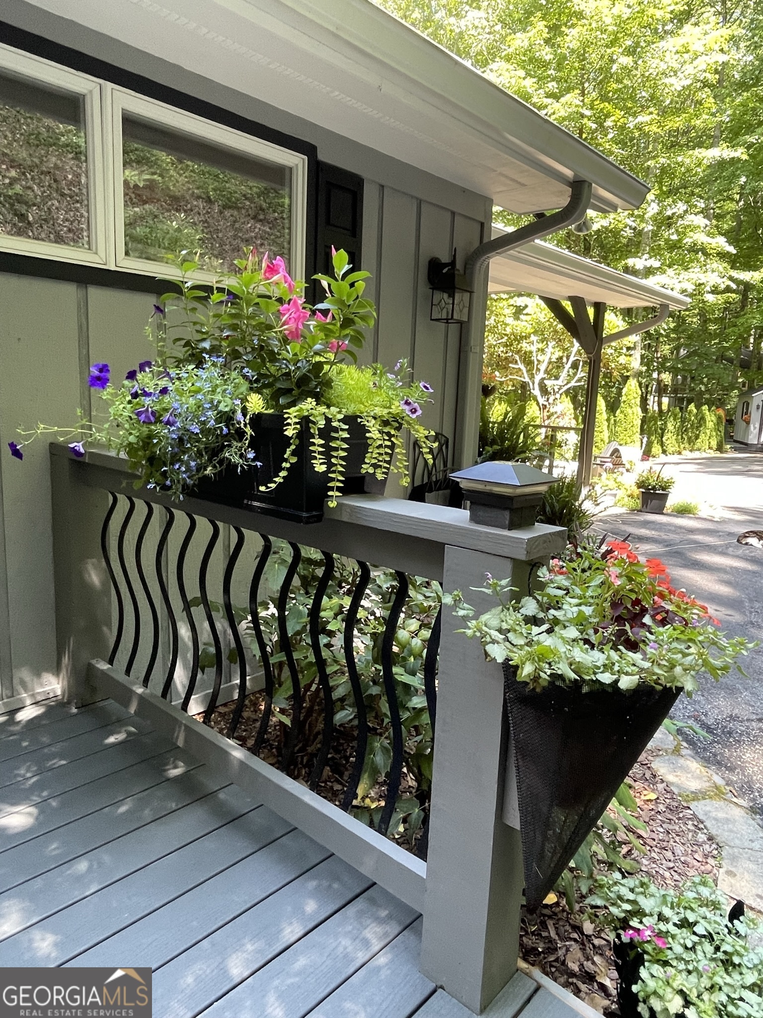 499 Ridgepole Drive Sky Valley, GA 30537 - Photo 27 of 58 a view of a porch with a bench