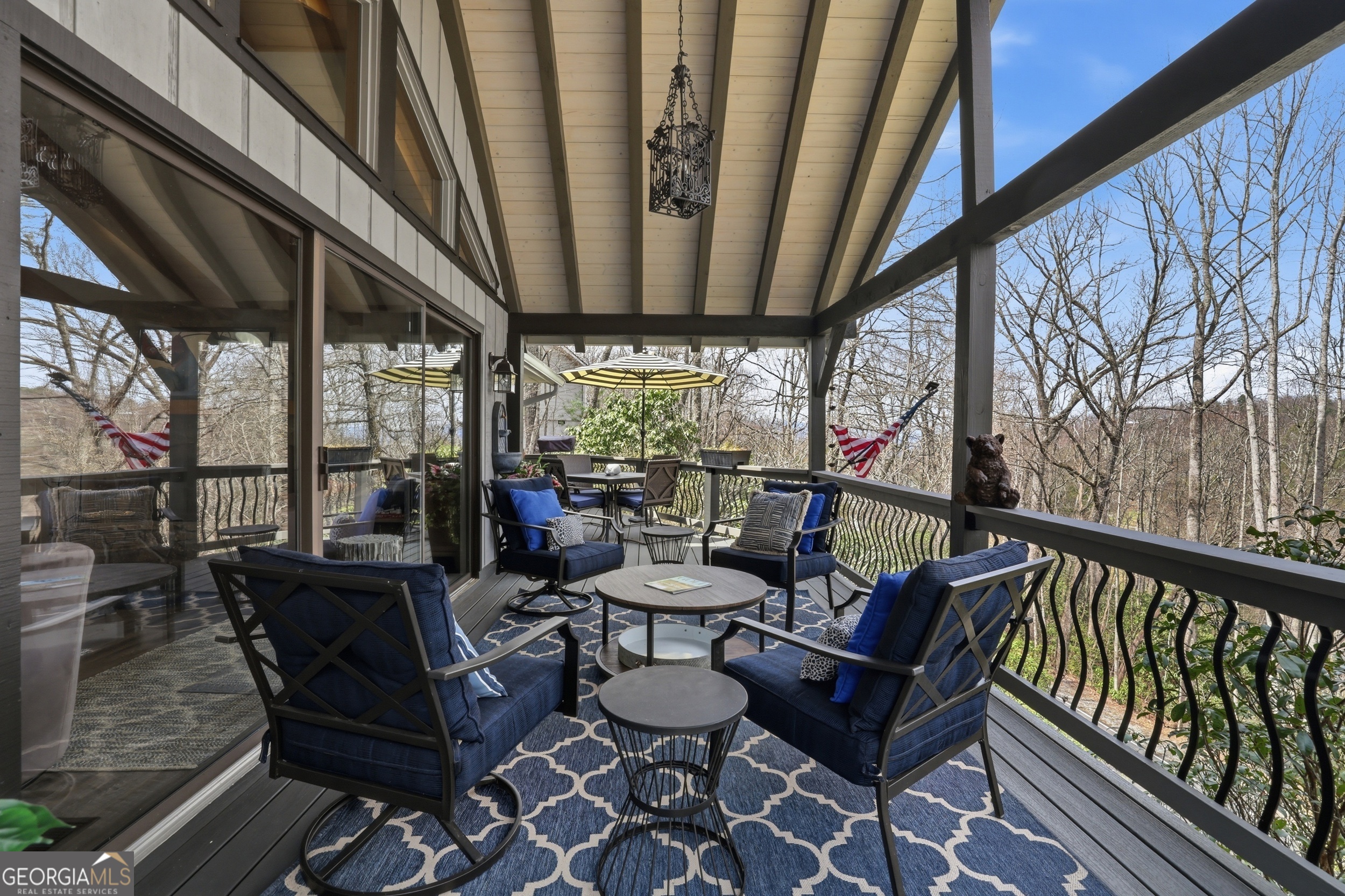 499 Ridgepole Drive Sky Valley, GA 30537 - Photo 52 of 58 a view of a chairs and table in the balcony
