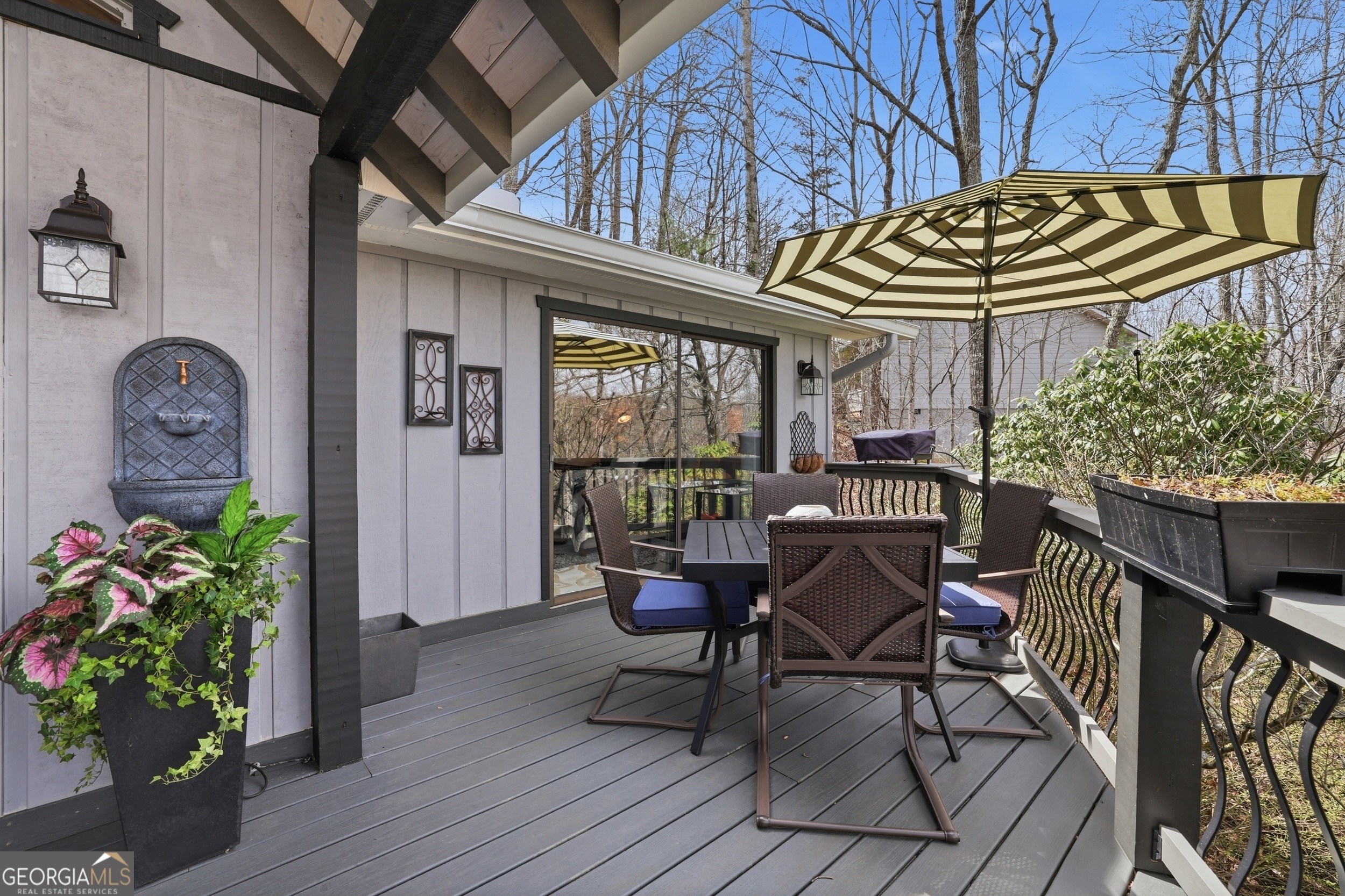 499 Ridgepole Drive Sky Valley, GA 30537 - Photo 54 of 58 a view of a chairs and table in a patio