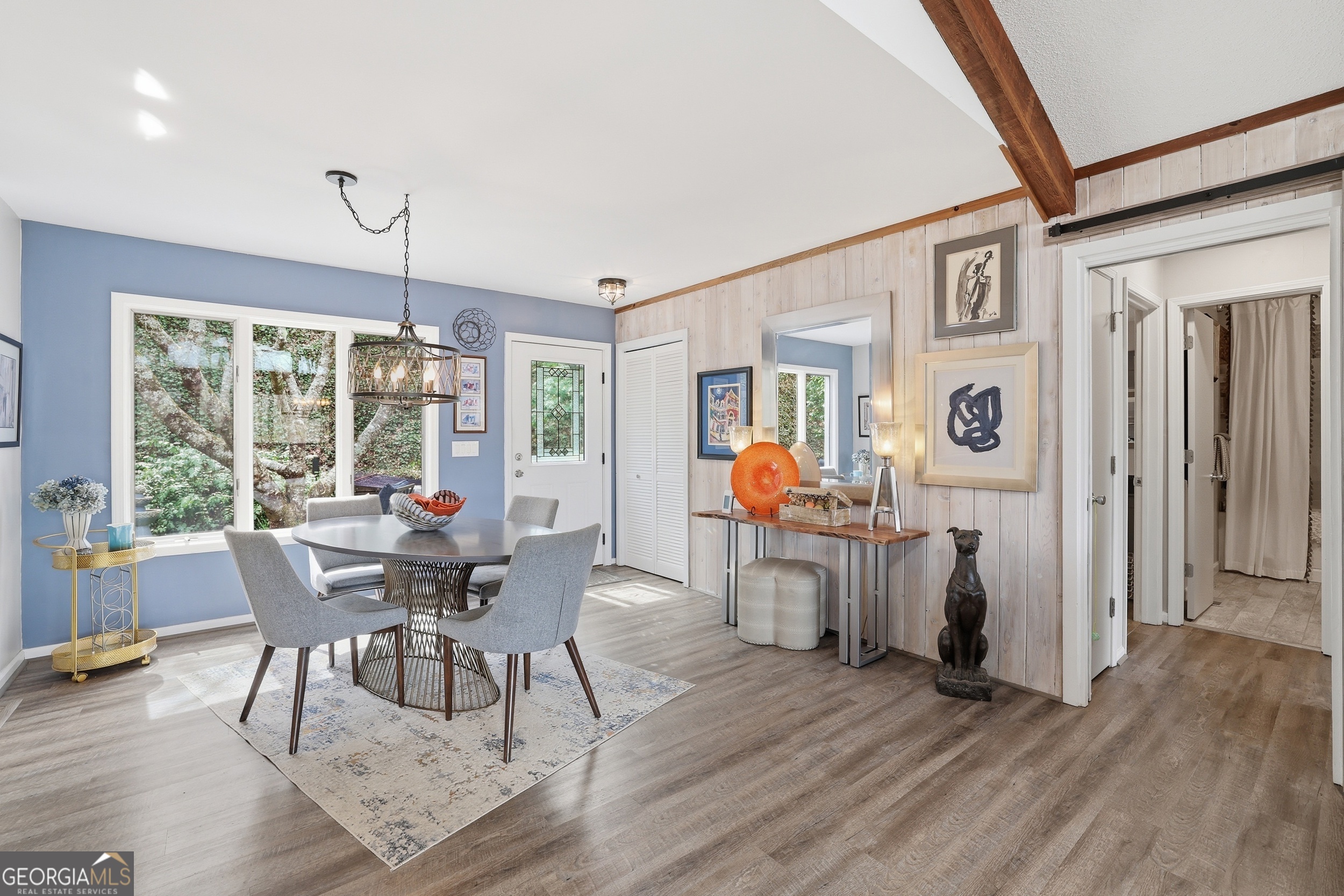 499 Ridgepole Drive Sky Valley, GA 30537 - Photo 7 of 58 a dining room with furniture and wooden floor