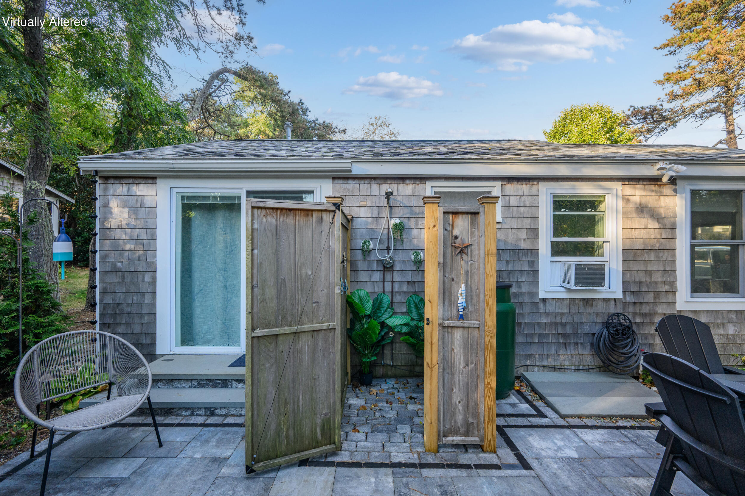 82 Shore Road, Unit 8 Truro, MA 02666 - Photo 24 of 40 a view of house with patio