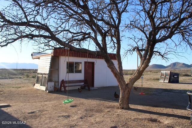 1201 East Old Stewart Road Willcox, AZ 85643 - Photo 39 of 49 a view of a house with a yard