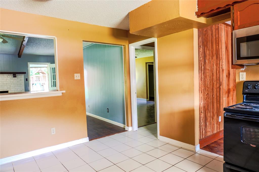 300 Coury Road Everman, TX 76140 - Photo 10 of 29 a view of a bathroom with mirror