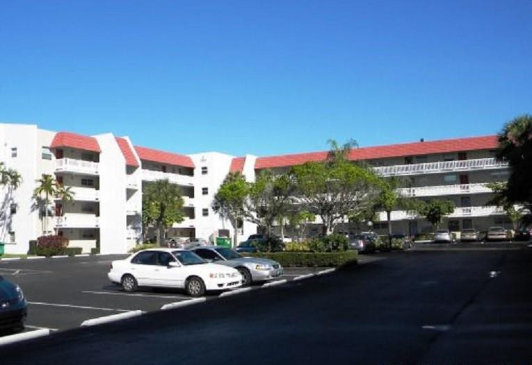 3551 Inverrary Drive, Unit 208 Lauderhill, FL 33319 - Photo 1 of 15 a view of street with cars