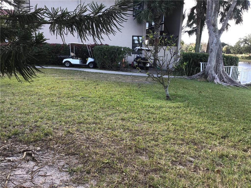 3551 Inverrary Drive, Unit 208 Lauderhill, FL 33319 - Photo 15 of 15 a swimming pool with outdoor seating and yard