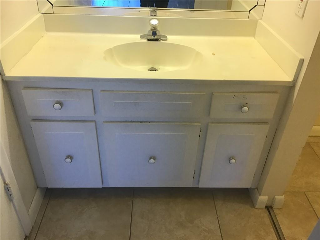 3551 Inverrary Drive, Unit 208 Lauderhill, FL 33319 - Photo 5 of 15 a bathroom with a sink