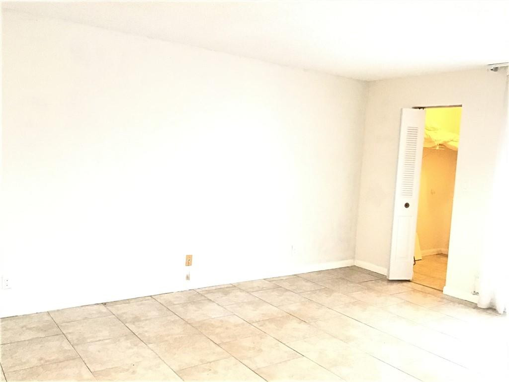 3551 Inverrary Drive, Unit 208 Lauderhill, FL 33319 - Photo 6 of 15 a view of a room with a window