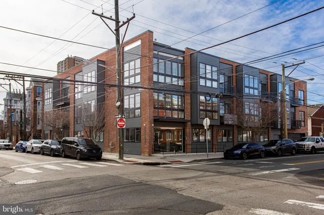 a view of a street with cars