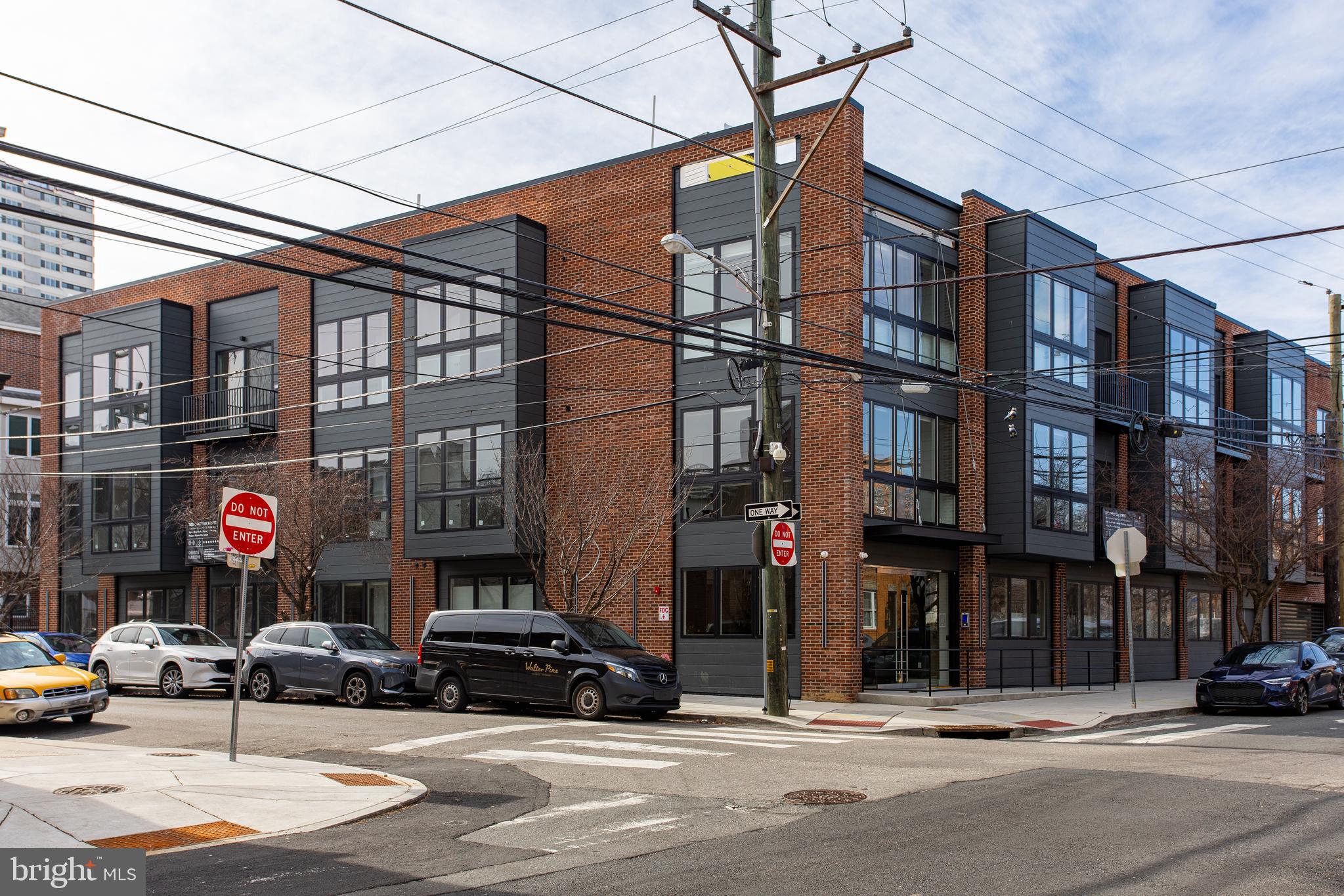 300 Christian Street, Unit 305 Philadelphia, PA 19147 - Photo 19 of 20 a car parked in front of a building