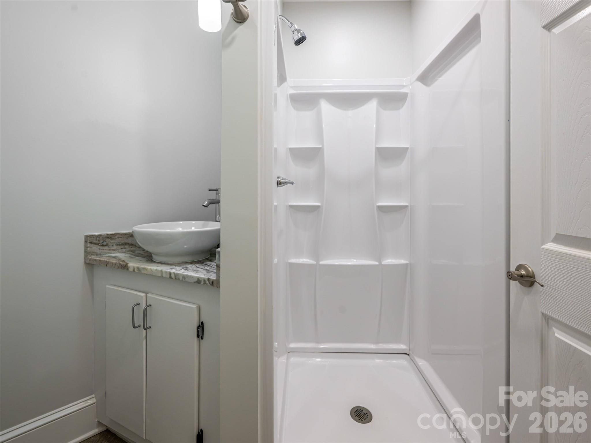 172 Reed Street Canton, NC 28716 - Photo 24 of 48 a bathroom with a shower