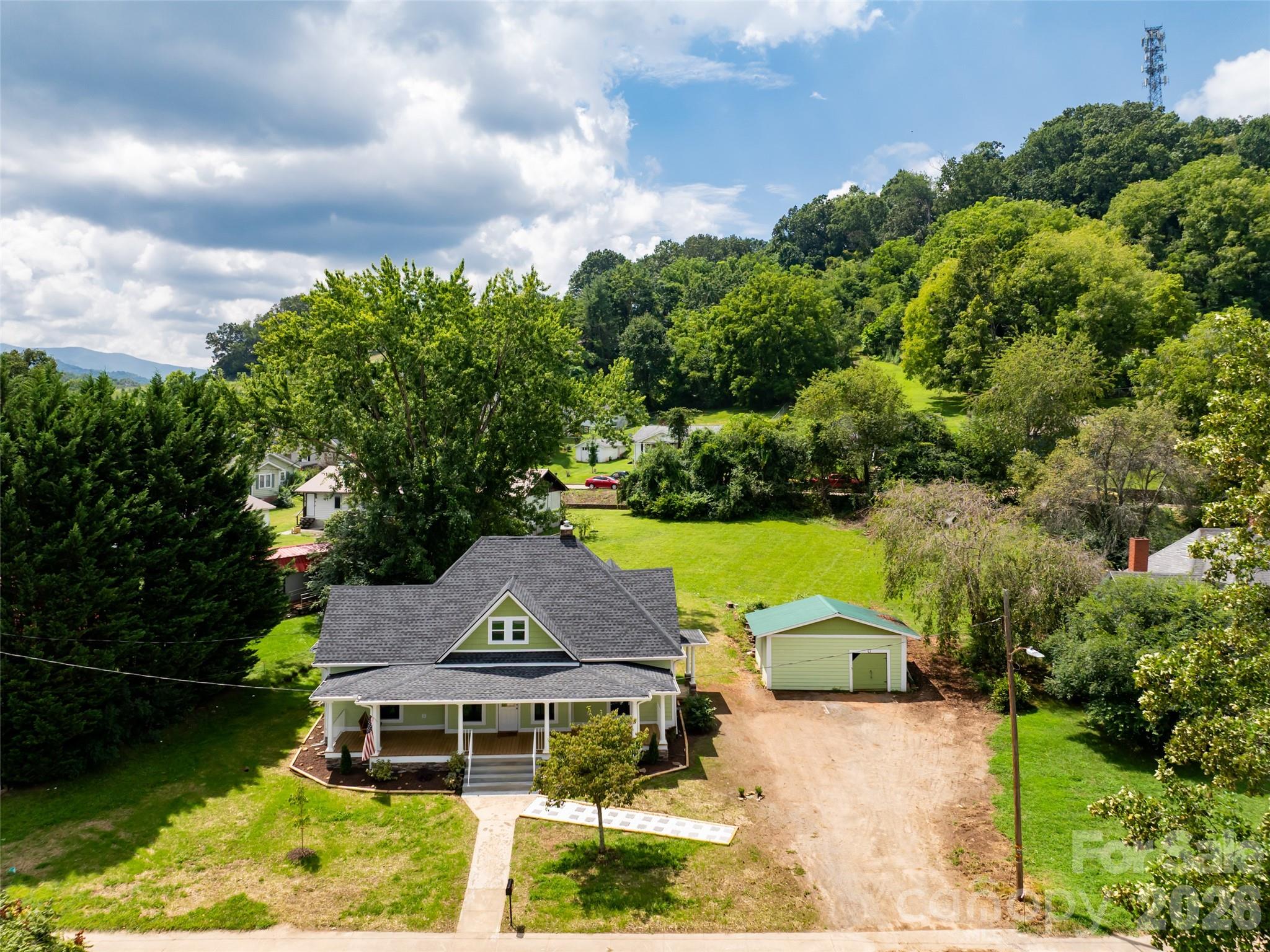 172 Reed Street Canton, NC 28716 - Photo 45 of 48 an aerial view of a house with garden space and street view