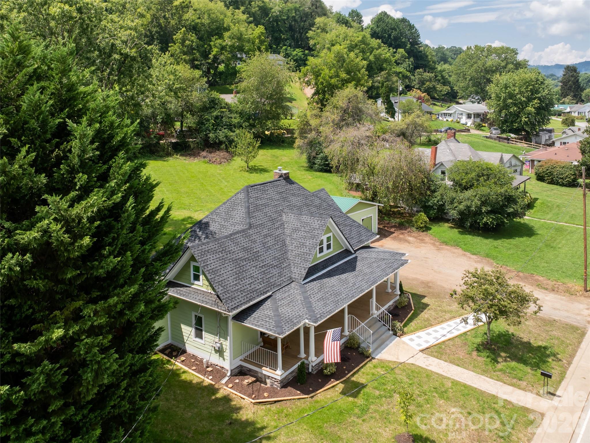 172 Reed Street Canton, NC 28716 - Photo 47 of 48 an aerial view of a house with a big yard