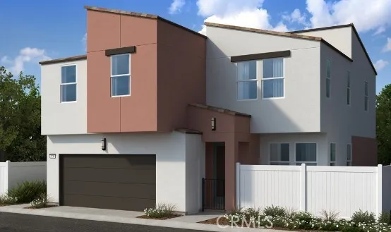 a front view of a house with garage