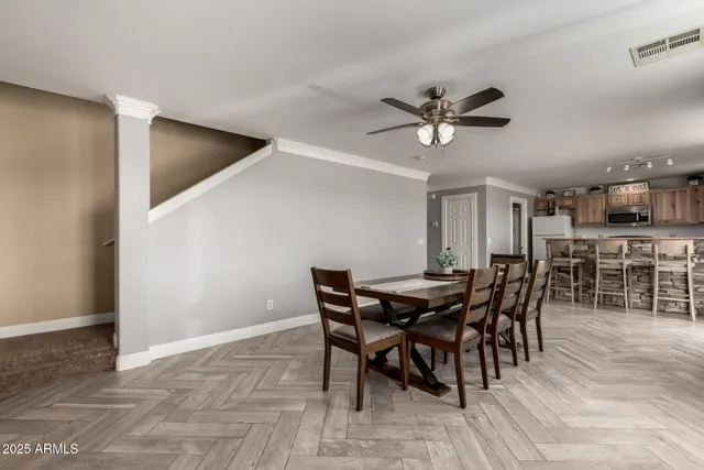 a view of a dining room with furniture