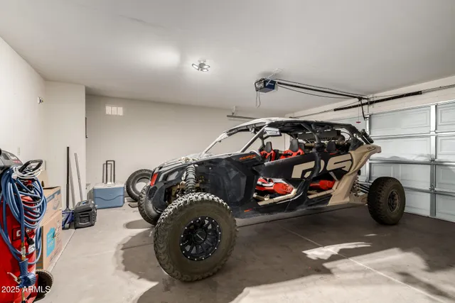 a view of a garage with cars