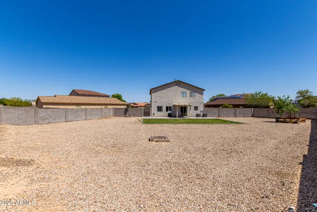 a house with trees in the background