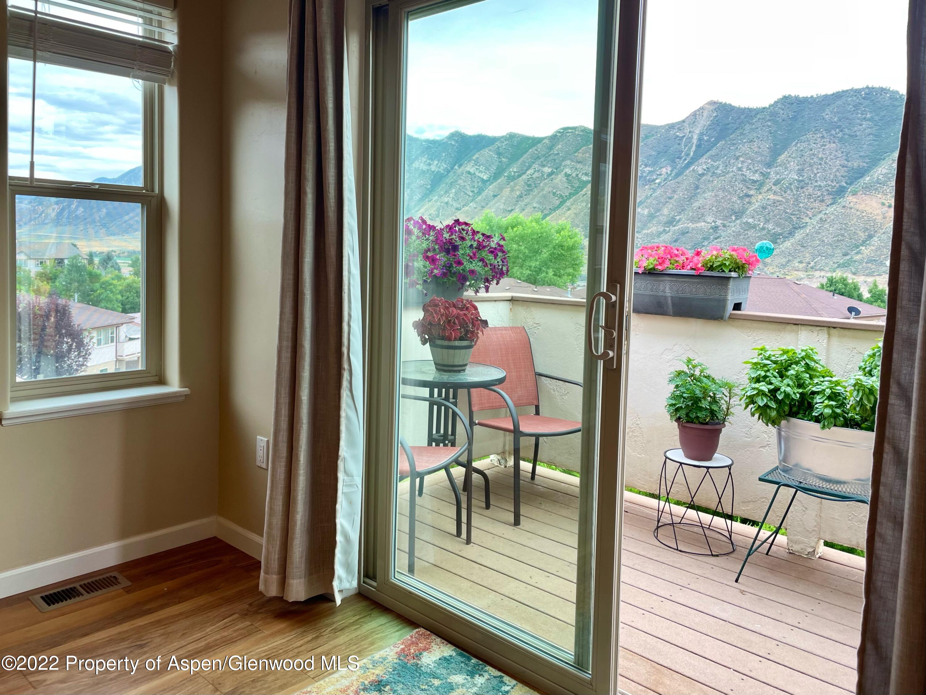 133 Castle Ridge Drive New Castle, CO 81647 - Photo 1 of 32 a view of a porch with furniture