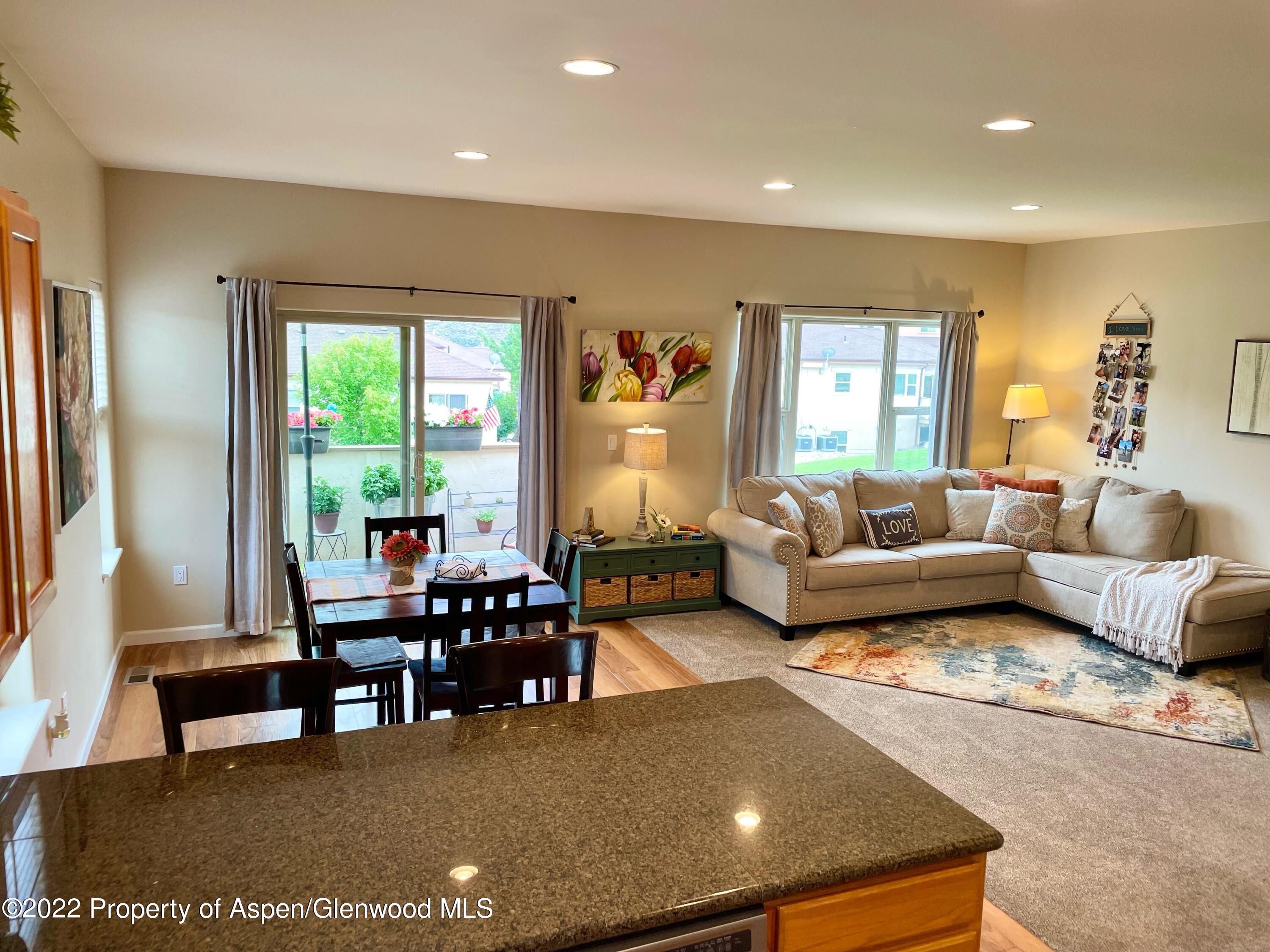133 Castle Ridge Drive New Castle, CO 81647 - Photo 20 of 32 a living room with furniture and a large window