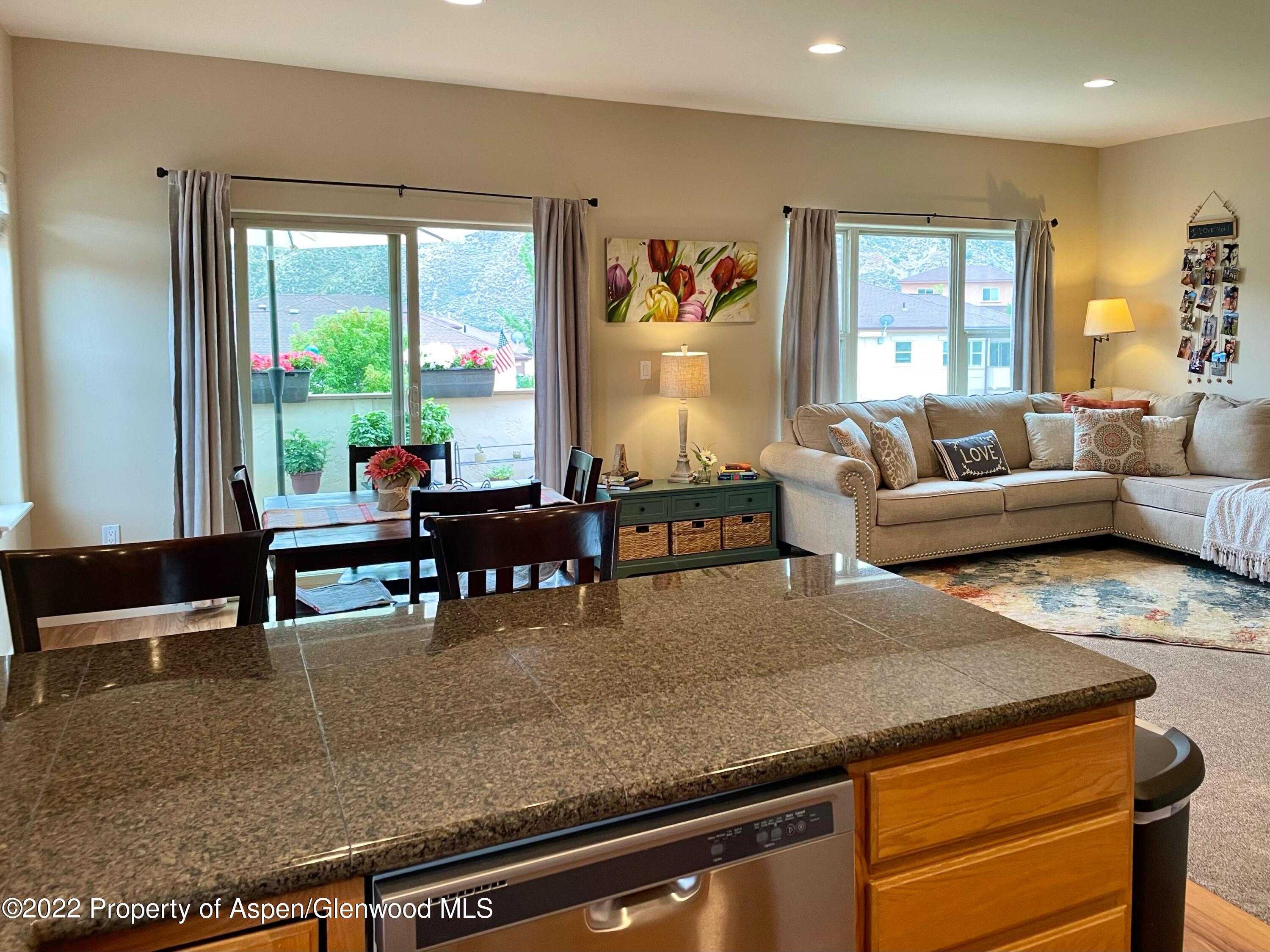133 Castle Ridge Drive New Castle, CO 81647 - Photo 21 of 32 a living room with furniture and large windows