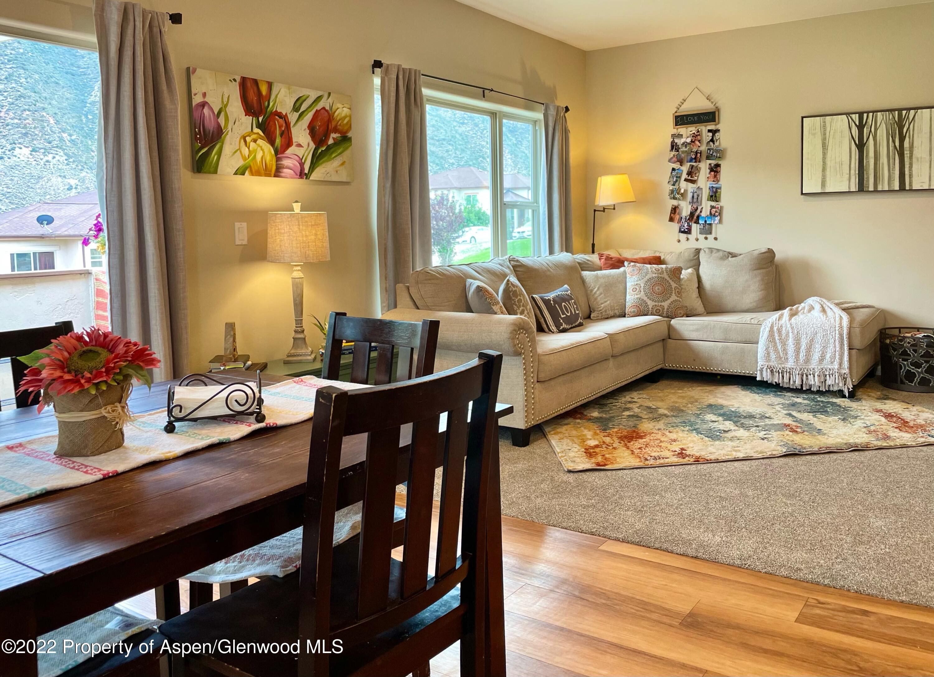 133 Castle Ridge Drive New Castle, CO 81647 - Photo 22 of 32 a living room with furniture and wooden floor