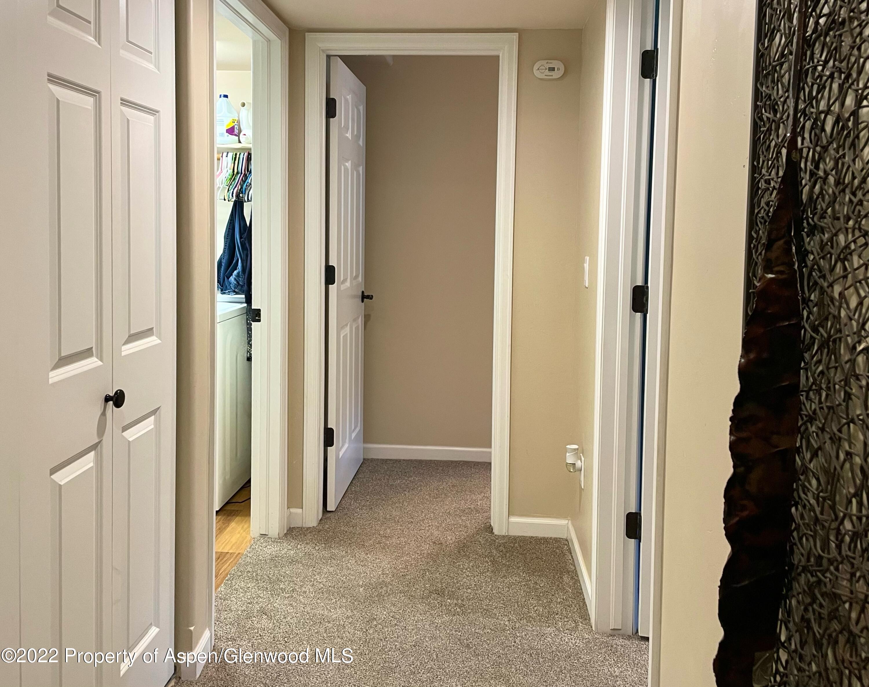 133 Castle Ridge Drive New Castle, CO 81647 - Photo 25 of 32 view of a bathroom with a glass door and shower