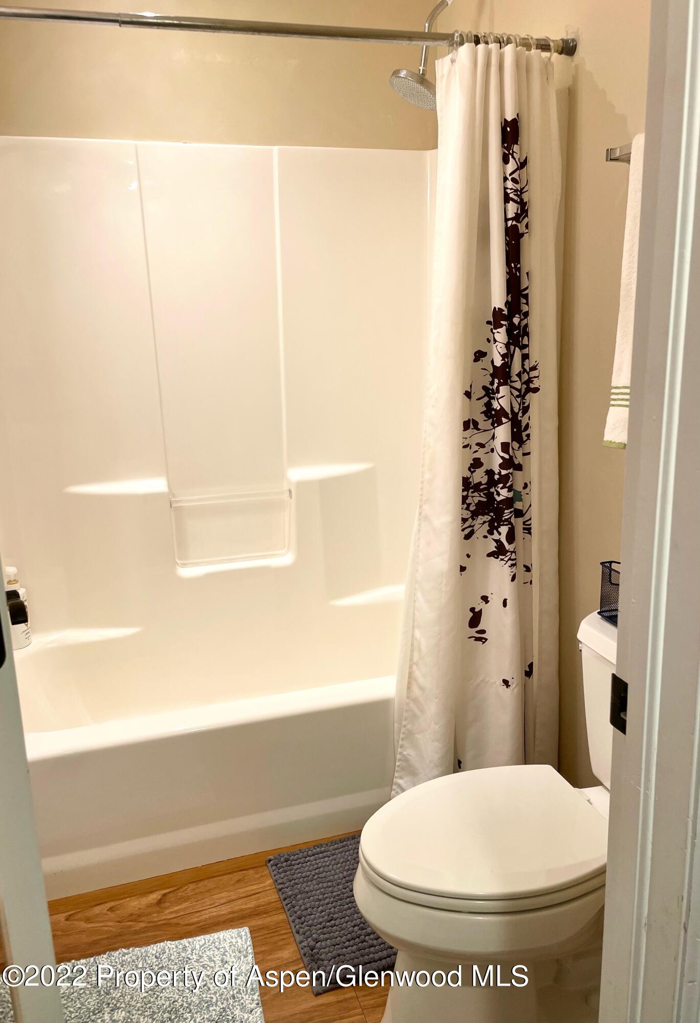 133 Castle Ridge Drive New Castle, CO 81647 - Photo 32 of 32 a bathroom with a toilet and a shower