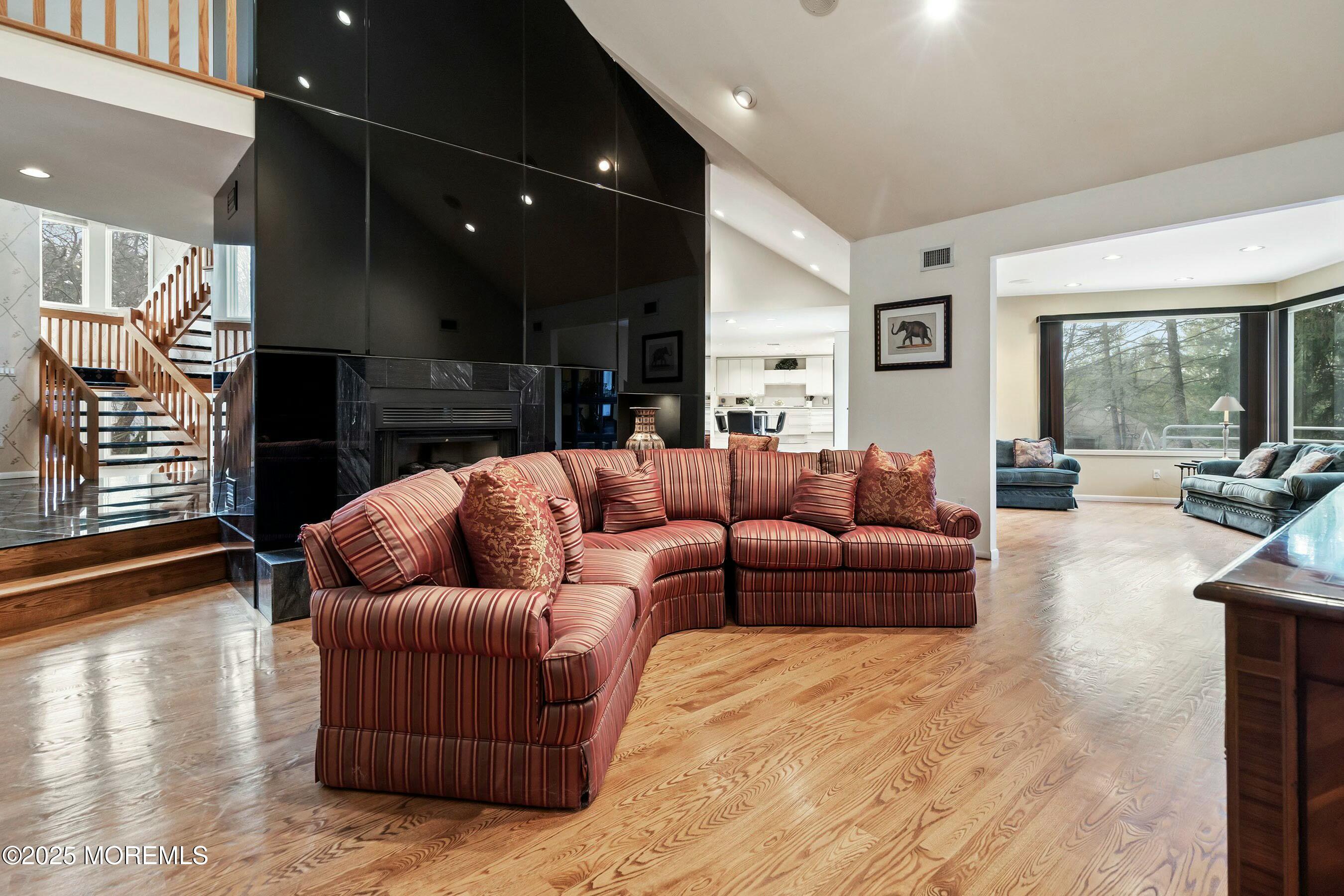 7 Jayhawk Way Holmdel, NJ 07733 - Photo 9 of 60 a living room with furniture window and wooden floor