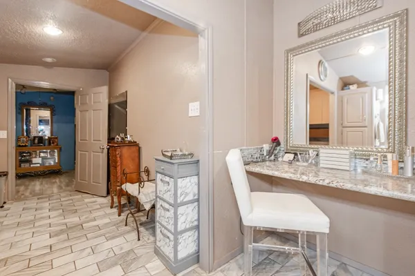 a dining room with table and chairs