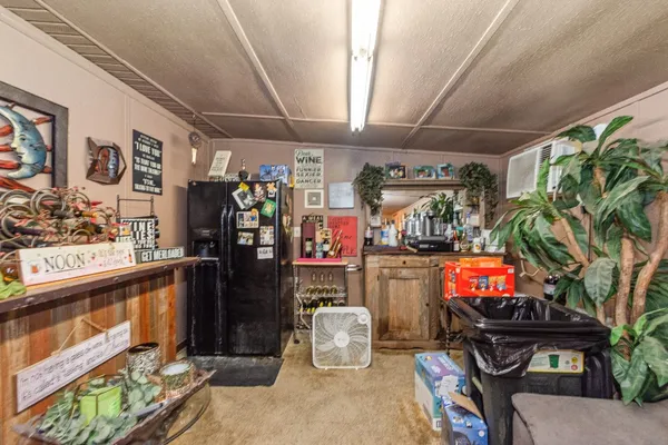 a room with lots of bottles of alcohol