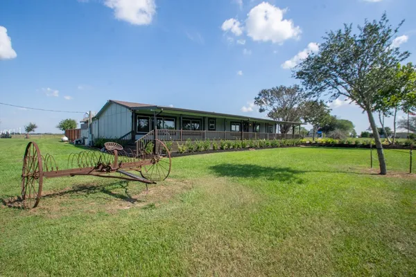 a view of a park with swings and slides
