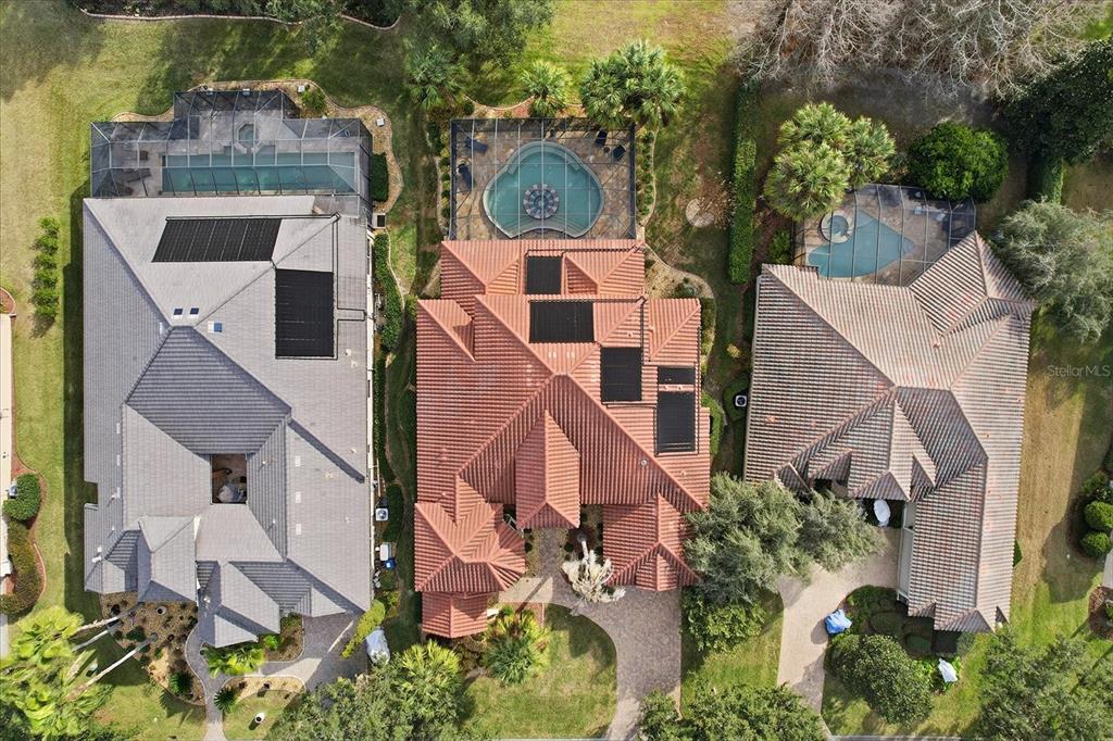 1416 North Ridge Meadow Path Hernando, FL 34442 - Photo 62 of 68 an aerial view of a house with a yard and large trees