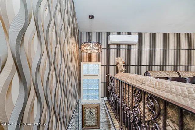 a view of balcony with furniture