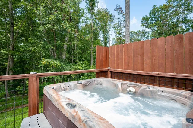 a view of a swimming pool with a tub