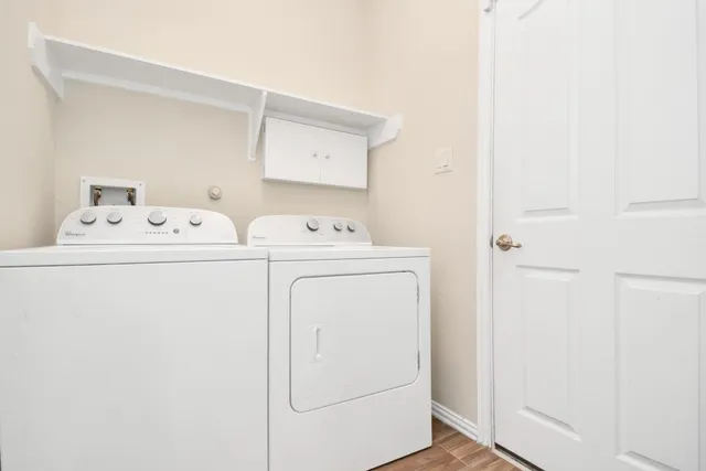 a utility room with dryer and washer