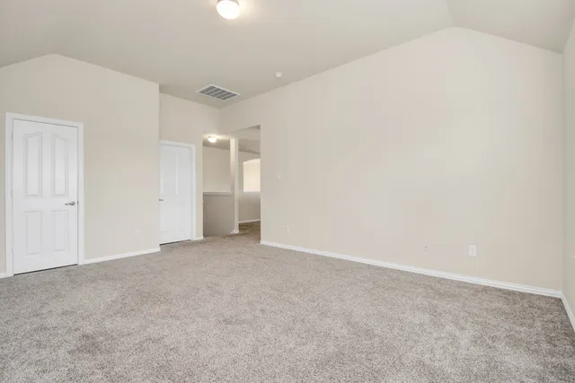 an empty room with an entryway