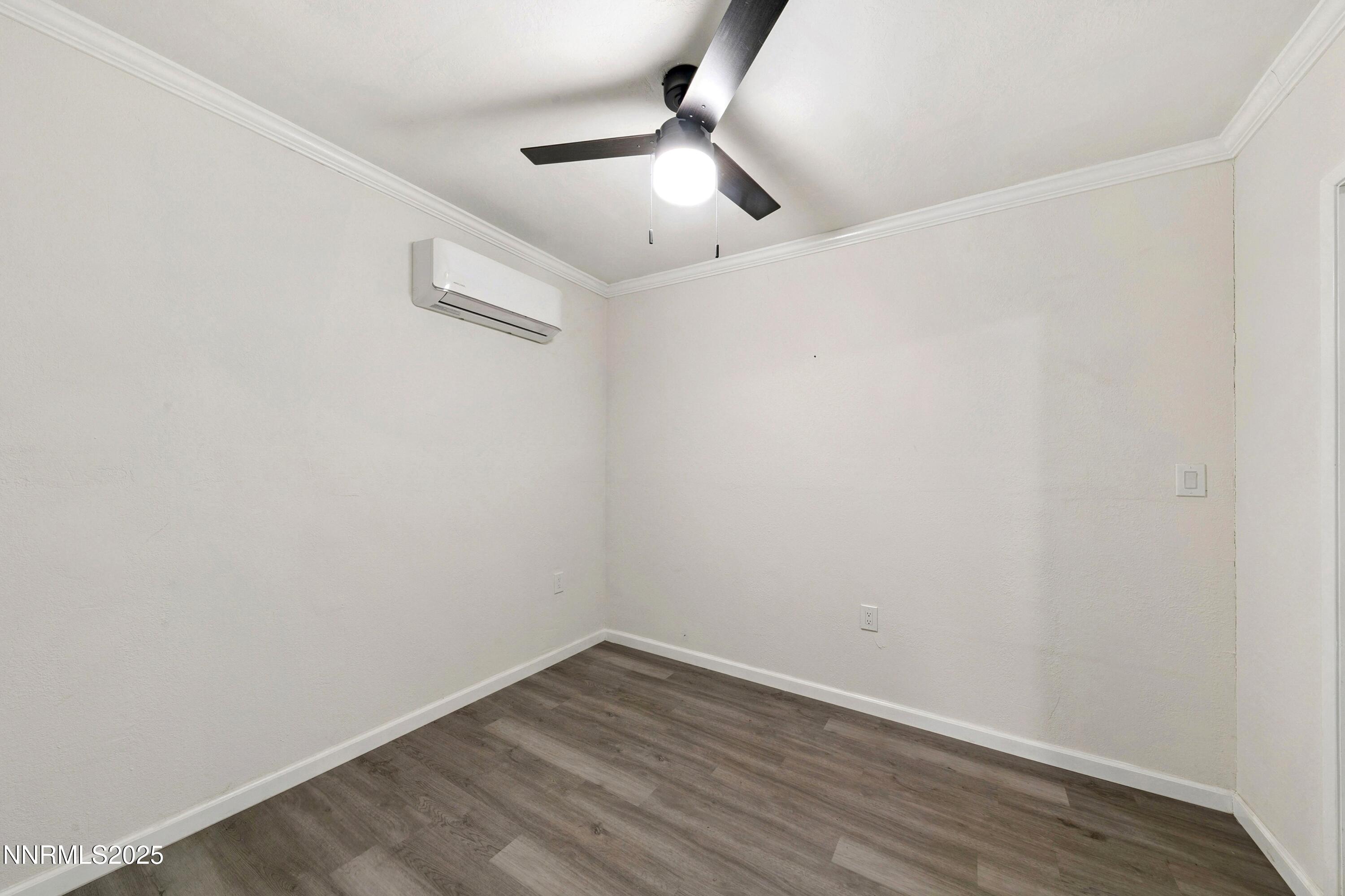 207 Cedar Ridge Drive Zephyr Cove, NV 89448 - Photo 15 of 26 a view of an empty room with wooden floor